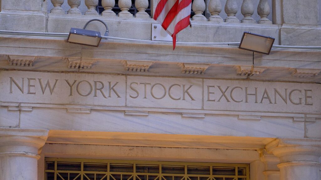 Stocks Settle Higher as Chipmakers Rally and Crude Prices Fall